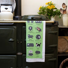 Load image into Gallery viewer, Herdwicks of the Lake District Tea Towel on an AGA