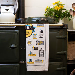 Iconic Pubs of the Lake District Tea Towel on an AGA